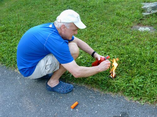 John has a mishap trying to light his stove. The grass caught fire, and we didn't use his stove the rest of the trip.