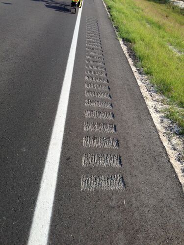 A *good* rumblestrip. Note there is room on the outside for a bike and single-wheeled trailer.