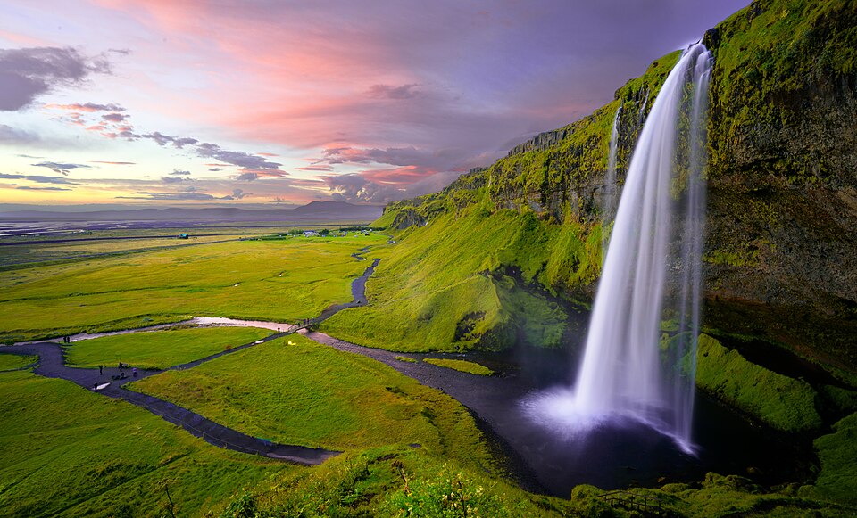 Seljalandsfoss — the path circles behind the curtain