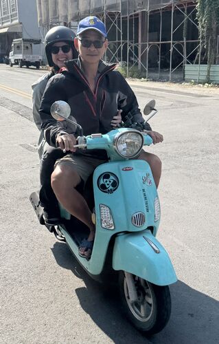 We were delivered from the beach hanging on the back of scooters