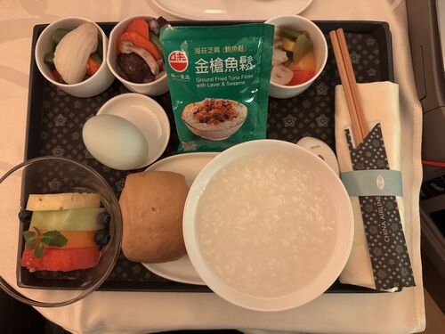 Morning breakfast: porridge, salted eggs, brown sugar steamed bun