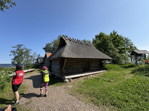 Old fishing huts with thatched roofs