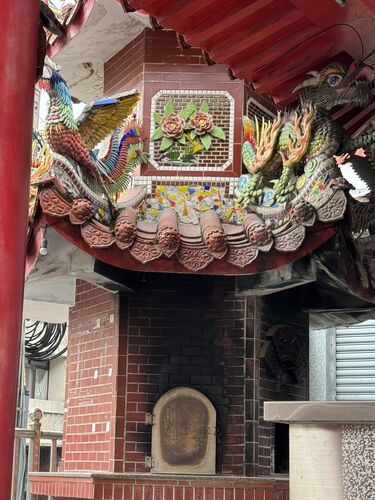 Stopping to see the local god's temple on the way back